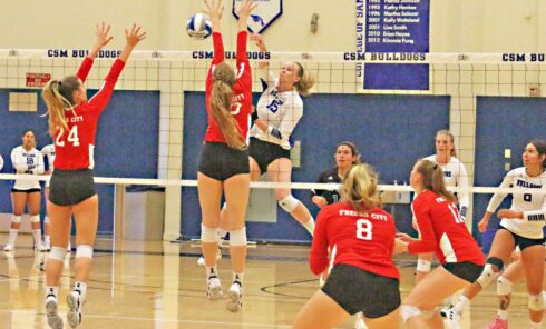 CSM middle blocker Valerie Bruk goes on the offensive during extra points of the third set in Saturday’s home win over Fresno City. Photo by Terry Bernal.
